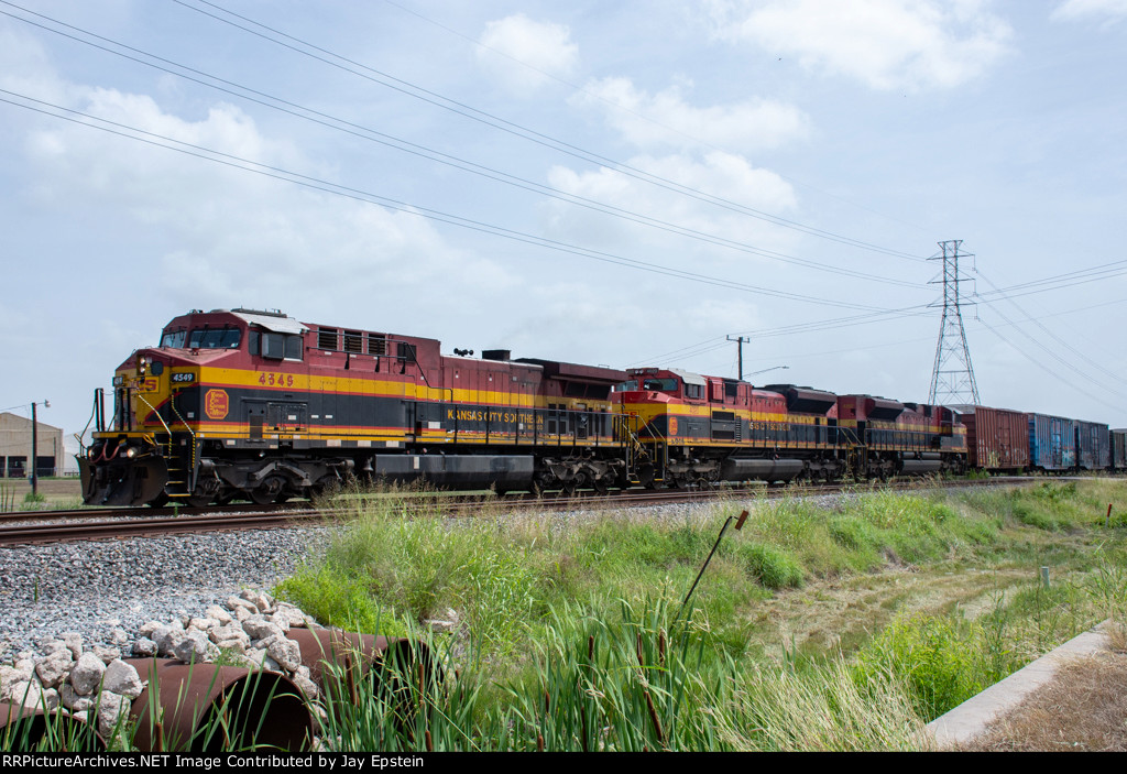 KCSM 4549 starts out of the McHattie Siding 